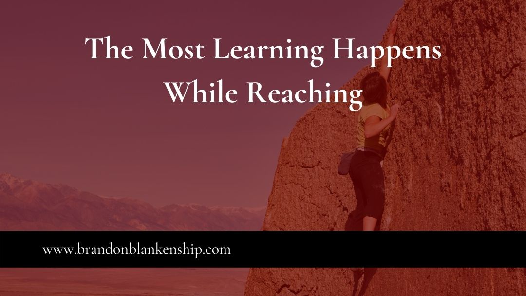 Woman reaching the most learning happens while reaching